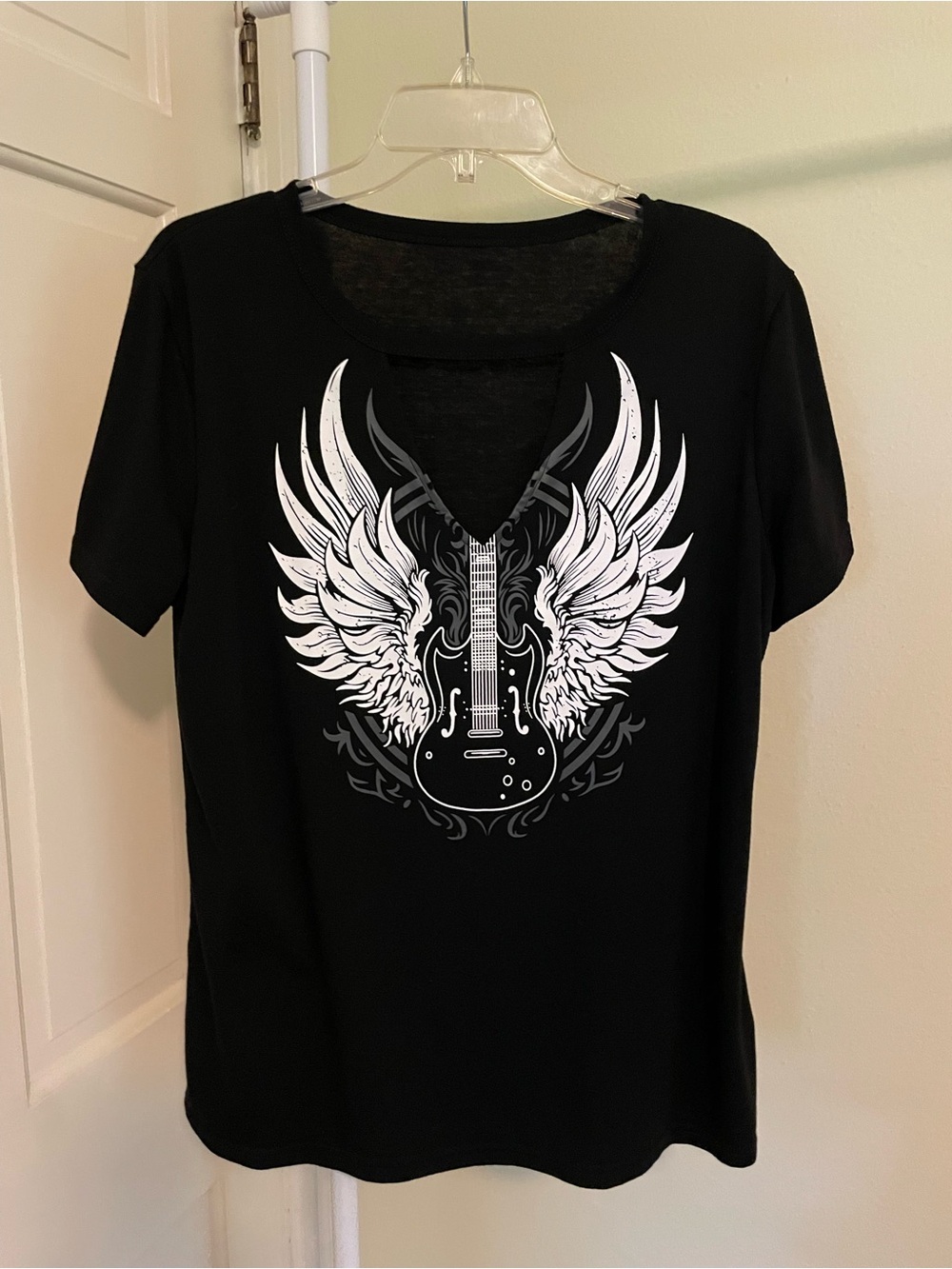 Like New Black Tee with Winged Guitar Graphic. Key Hole Front Neck. XL.